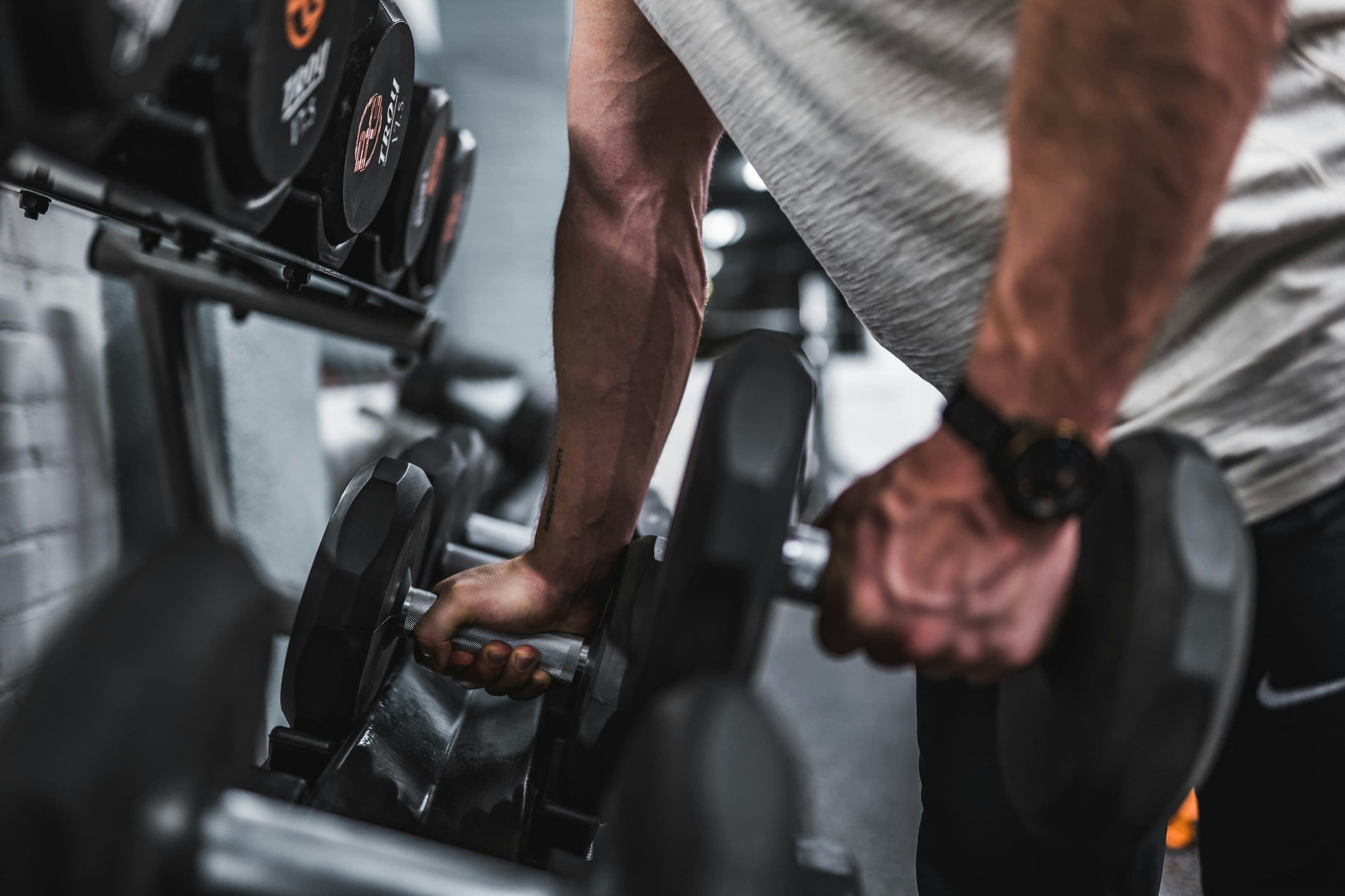 Athlete mid-workout with weights